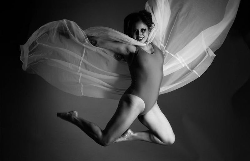 Person captured mid-movement showing fluidity and grace.